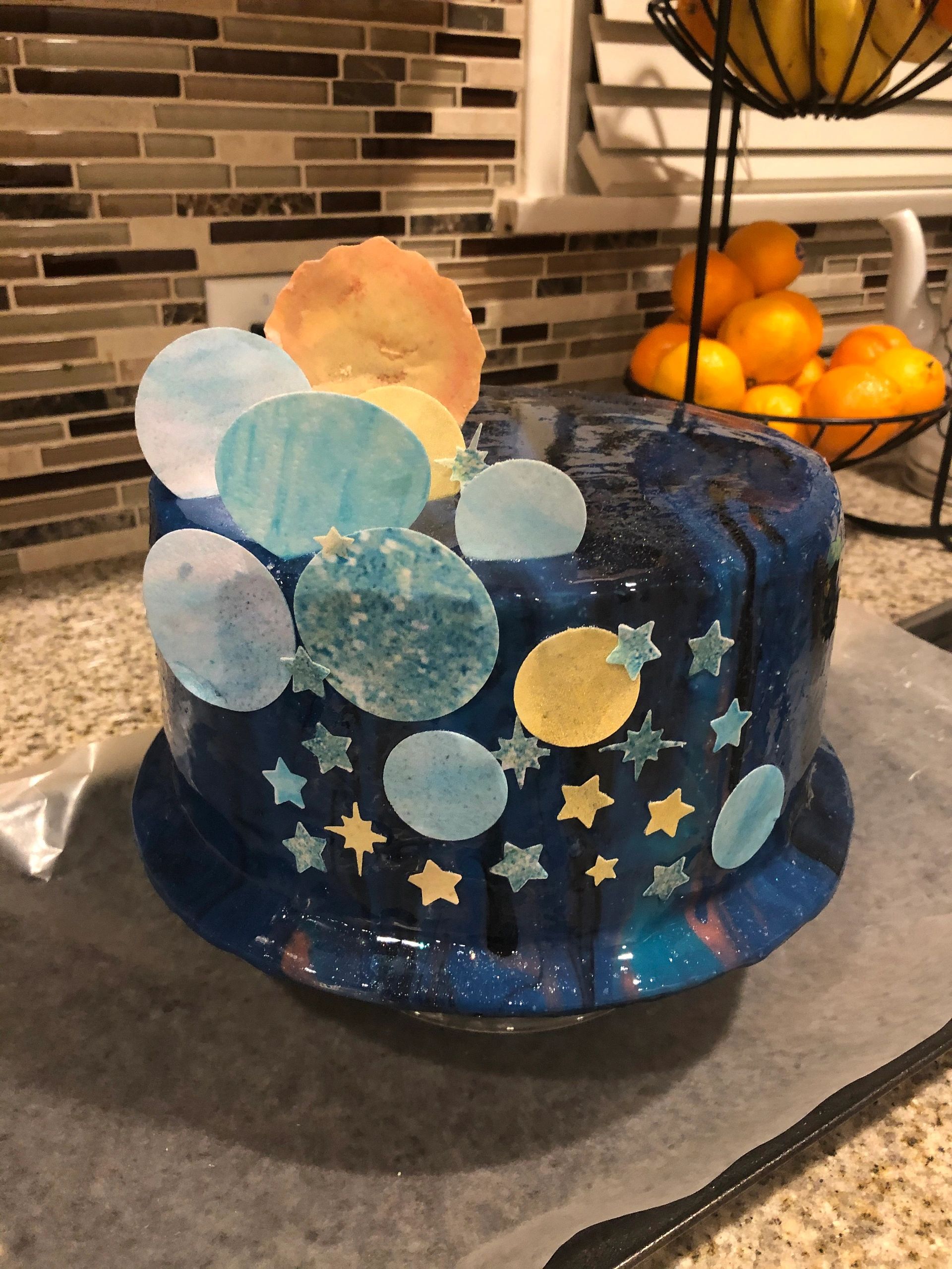 Dark blue and gold planets wafer paper outer space party cake