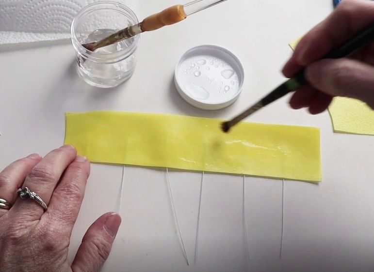 Condition the paper and cut out the petals. Condition the paper and cut out the petals.