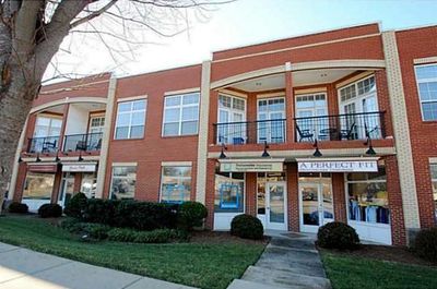 Front of building of furnished apartment in downtown Matthews, NC