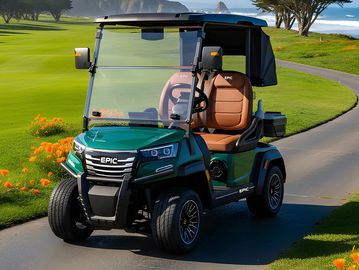 Forest green EPIC E20FX golf cart on the cart path between holes.