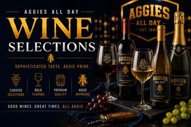 Elegant Aggies All Day wine display with bottles, glasses, and grapes.
