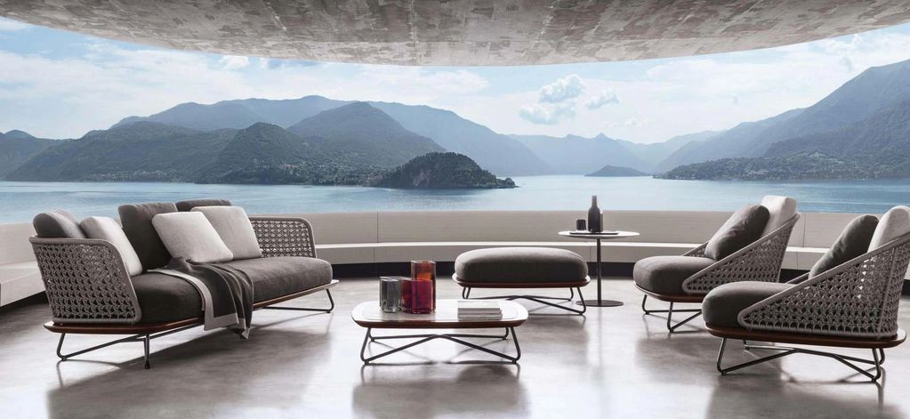 Horizon collection: Santorini sofa, lounge chairs, ottoman and tables overlooking a lake
