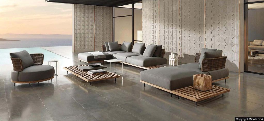 Solstice collection — Modular sofas and low slatted tables in warm wood tones. Deep cushions and gen