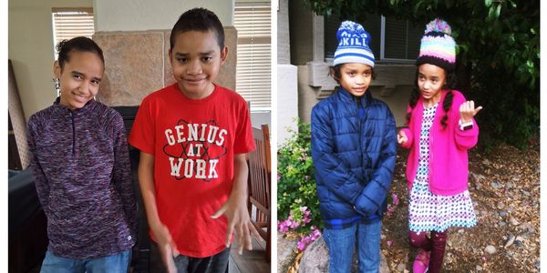 Two kids posing indoors and outdoors, dressed casually and warmly.