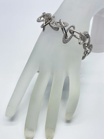 Custom made Italian link bracelet. 18 KT white gold (50.3 grams) with 10.03 CT in diamonds.