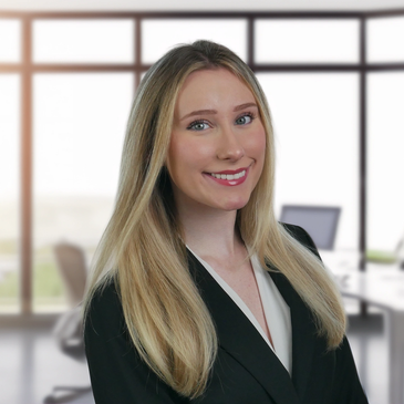 Professional woman smiling in office.