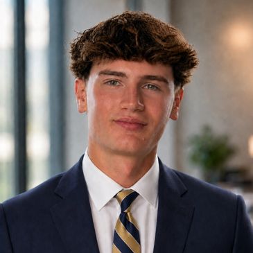 Young man in a suit and striped tie.