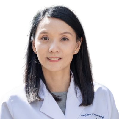 Female doctor with dark hair wearing a white coat.