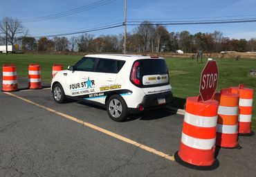 The parallel parking portion of the driver's exam is conducted in the parking lot at our testing cen