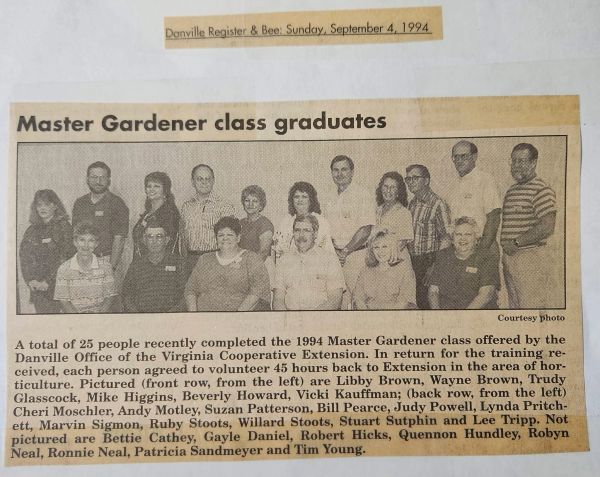 newspaper clipping with picture of a group of people graduating as Master Gardeners with a list of n