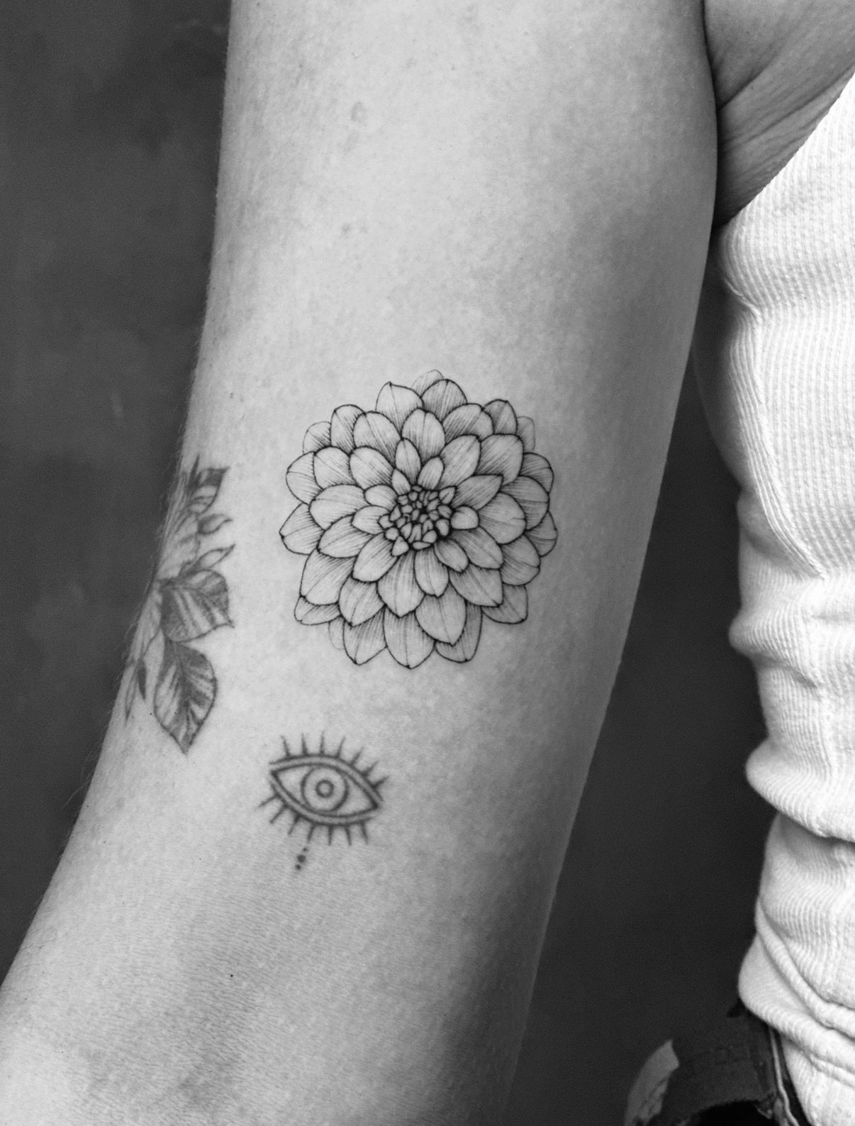 Dahlia tattoo by Diego Vago at Nomadttt
