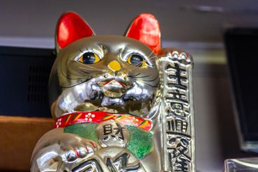 A Cat In Ceramic With Chinese