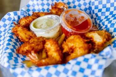 A Bowl Of Fries With Dip 