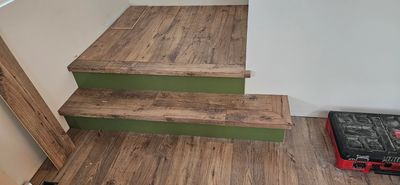 Some fun Laminate stairs with custom nosing and painted mdf riser