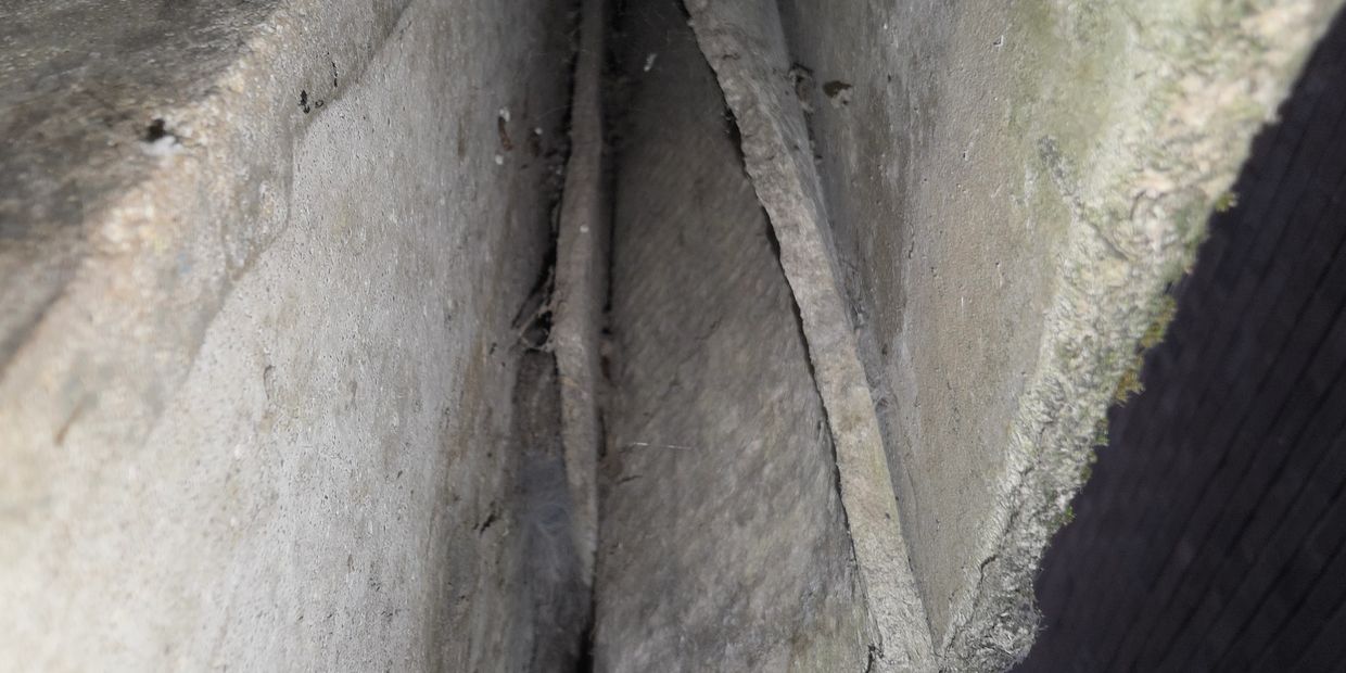 asbestos cement panels and sheeting between buildings
