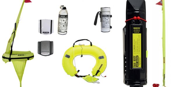 Various marine safety devices including lifebuoys, markers, and signaling equipment.