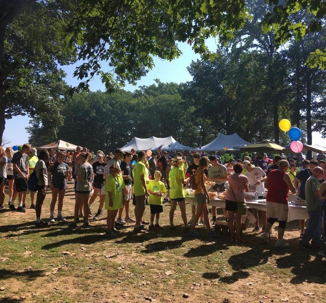 Long line of people waiting for Big Awesome BBQ at a fundraiser