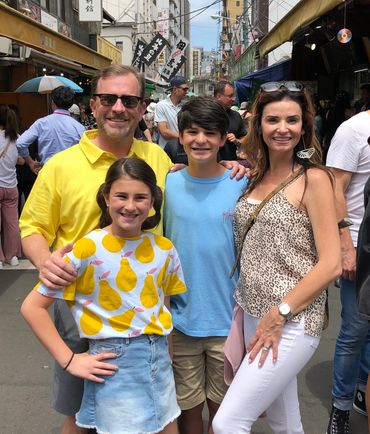 The Tate family touring the fish market in Tokyo, Japan