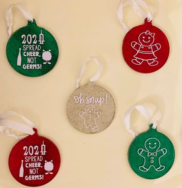 Customizable Christmas/Holiday Ornaments. 
$10.00 pre set designs as shown or create your own for $1