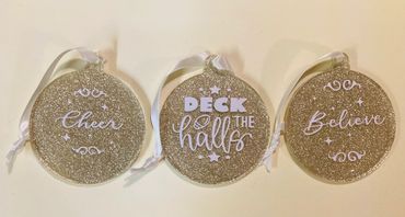 Customizable Christmas/Holiday Ornaments. 
$10.00 pre set designs as shown or create your own for $1