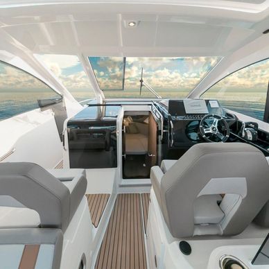 Modern yacht cockpit with comfortable seating and advanced navigation systems.