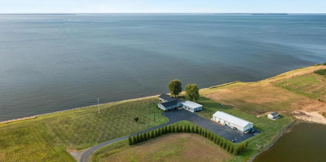 Property located between two bodies of water, seen from above.