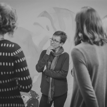 Image of group coaching session in person 