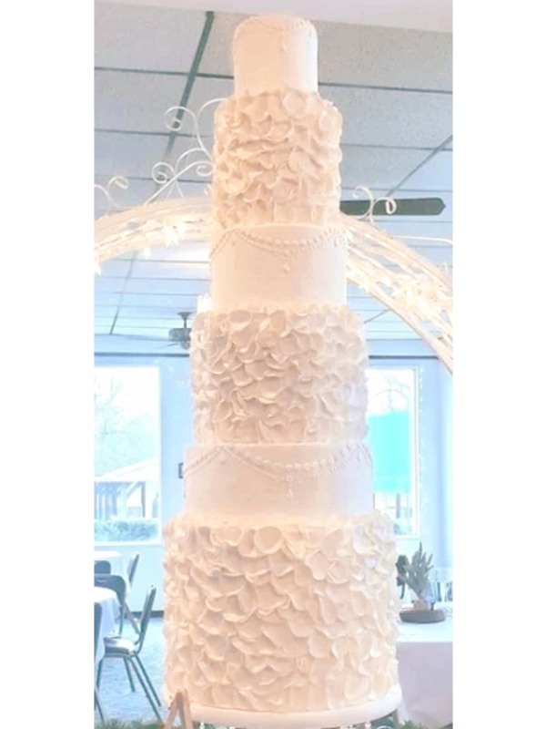 Kate's wedding cake with custom fondant work.