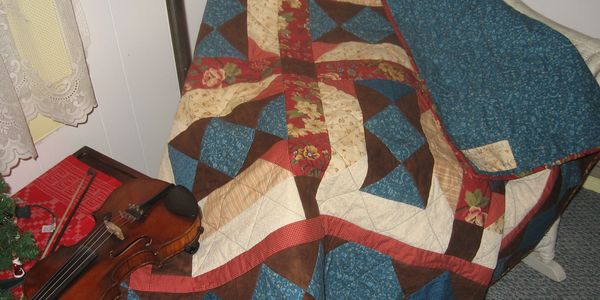 Design called Sonora.  Fabricated in 2009 with cotton fabric with cotton batting.