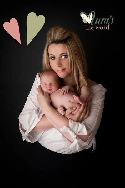 Mother holding newborn baby 