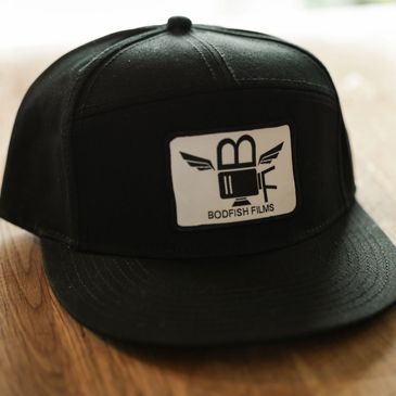 Black cap with a Bodfish Films logo patch.