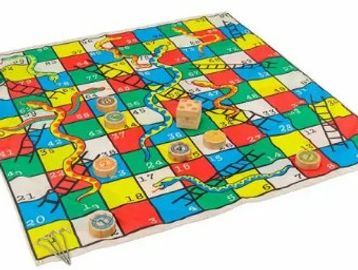 Colorful snakes and ladders board game with dice and tokens.