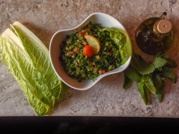 Parsley, onion, tomato, cracked wheat, lemon juice and olive oil.