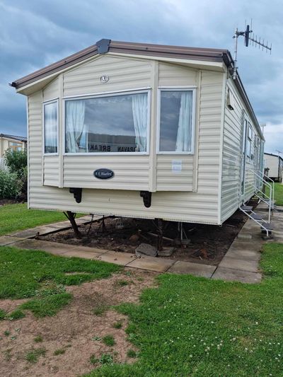 caravan part. Damaged caravan. static caravan disposal. caravan breakers