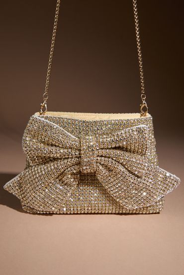 Sparkly handbag with a giant bow on the front. 