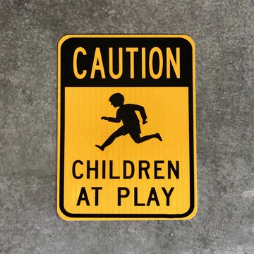 caution children at play custom sign black and yellow