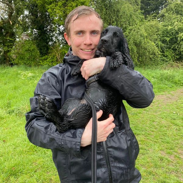 Reece with dog. Dog walker with Spaniel. Outside. Walking. Hertfordshire. Datchworth