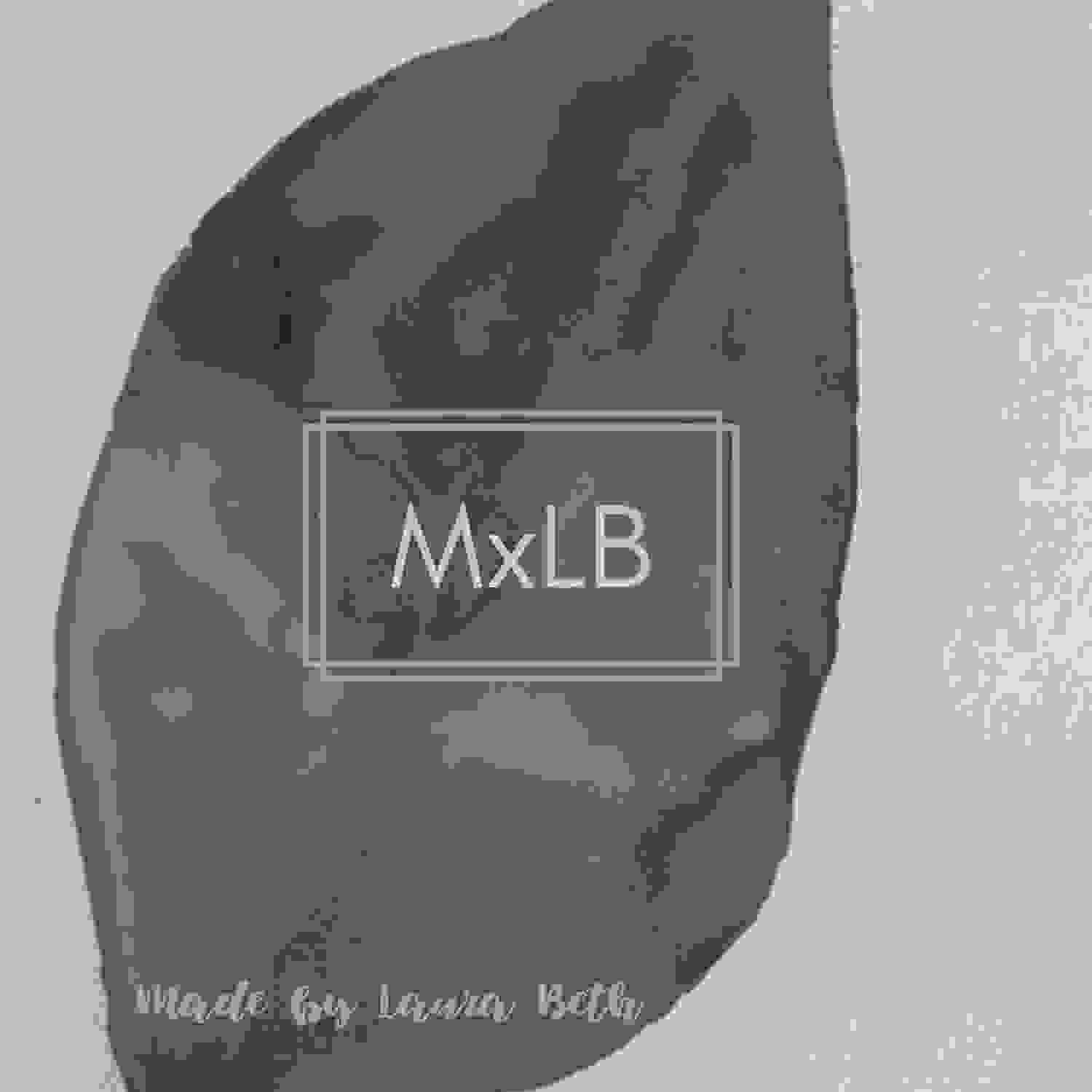 MxLB logo with watercolor background in blues and greens forming a leaf. Made by Laura Beth.