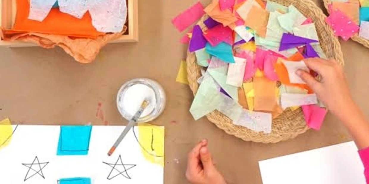 Hands crafting with colorful paper pieces and stars on drawing sheets.
