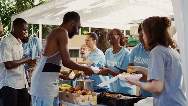 Empathetic volunteers give free meals and humanitarian relief to the needy and less fortunate.