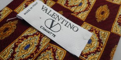 Valentino vintage necktie tasteful 1970s fashion piece for men suit accessory travel red gold tie