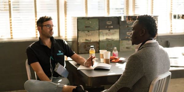 Two men casually having a business consulting meeting. 
