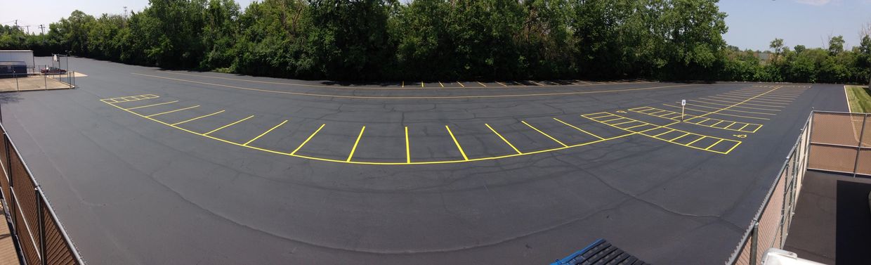 Sealcoat 150,000 sq ft, Asphalt Sealcoating 2 Coats, Hot Crackfilling, Patching & Restriping, Seal