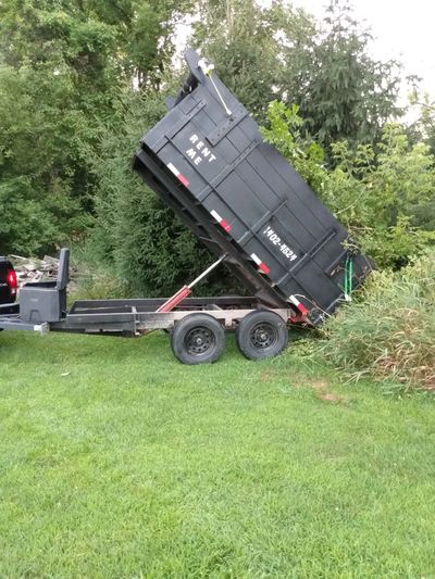 Junk removal dumpster rental brush hauling trash removal Owosso Michigan near me