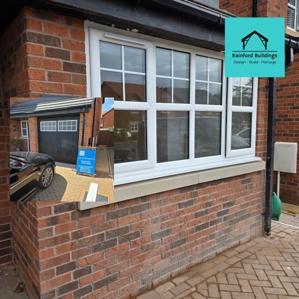 New white window installation on a brick exterior with Rainford Buildings logo.