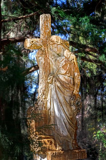 Cemetery Angel Statuary - lens flair.  Amelia Island,  FL