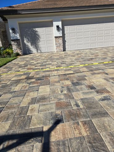 Driveway entrance with yellow caution tape