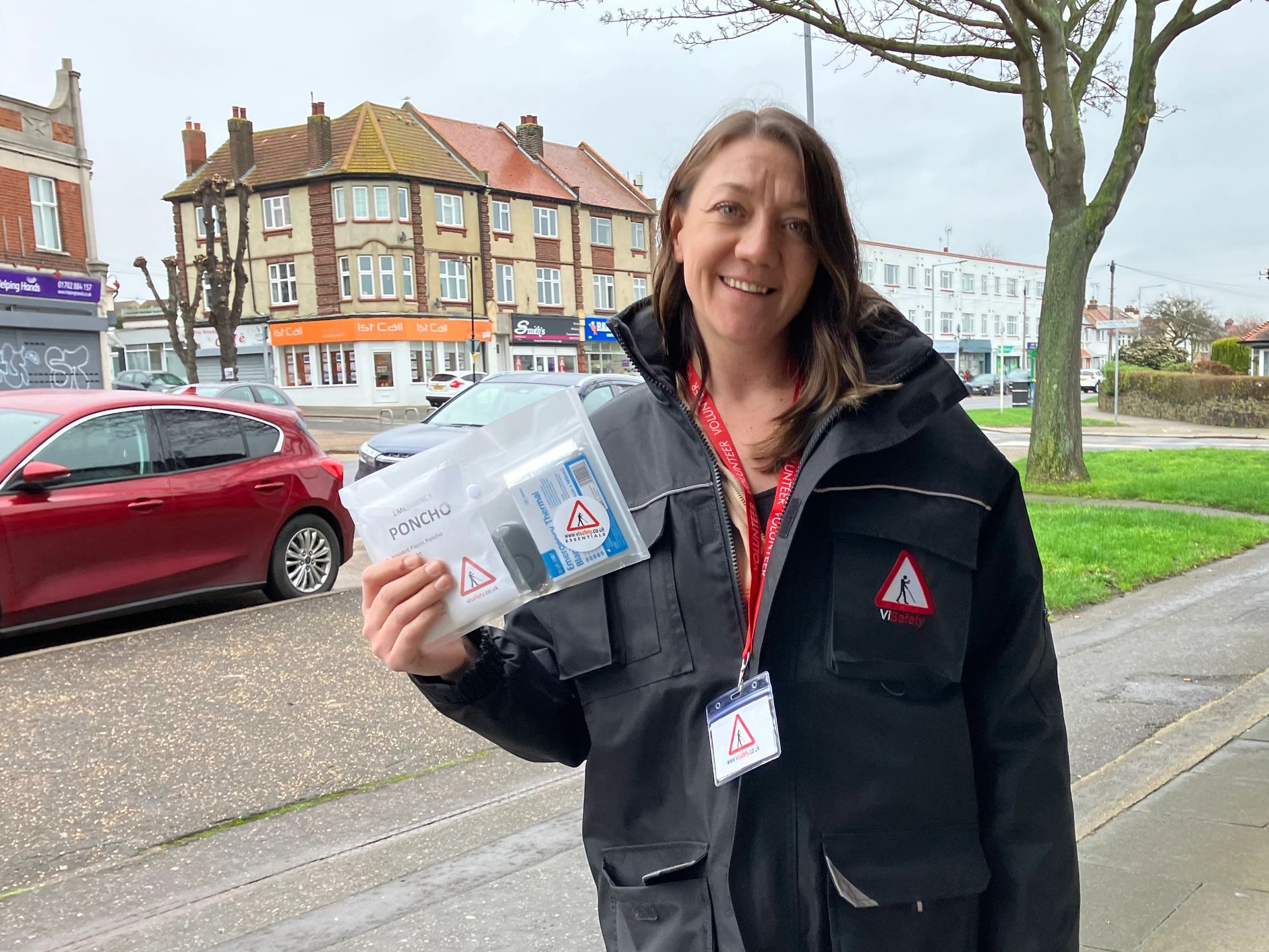 V I Safety volunteer showing a safety pack that we sell