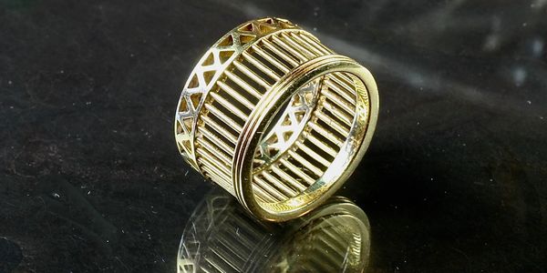 A Golden Bracelet On the table