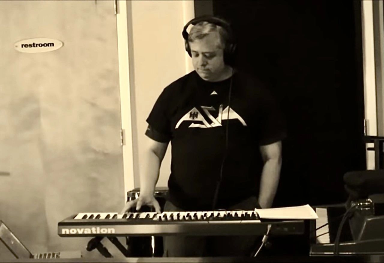 Brian O'Sullivan playing during video shoot for Asia's "Never In A Million Years"